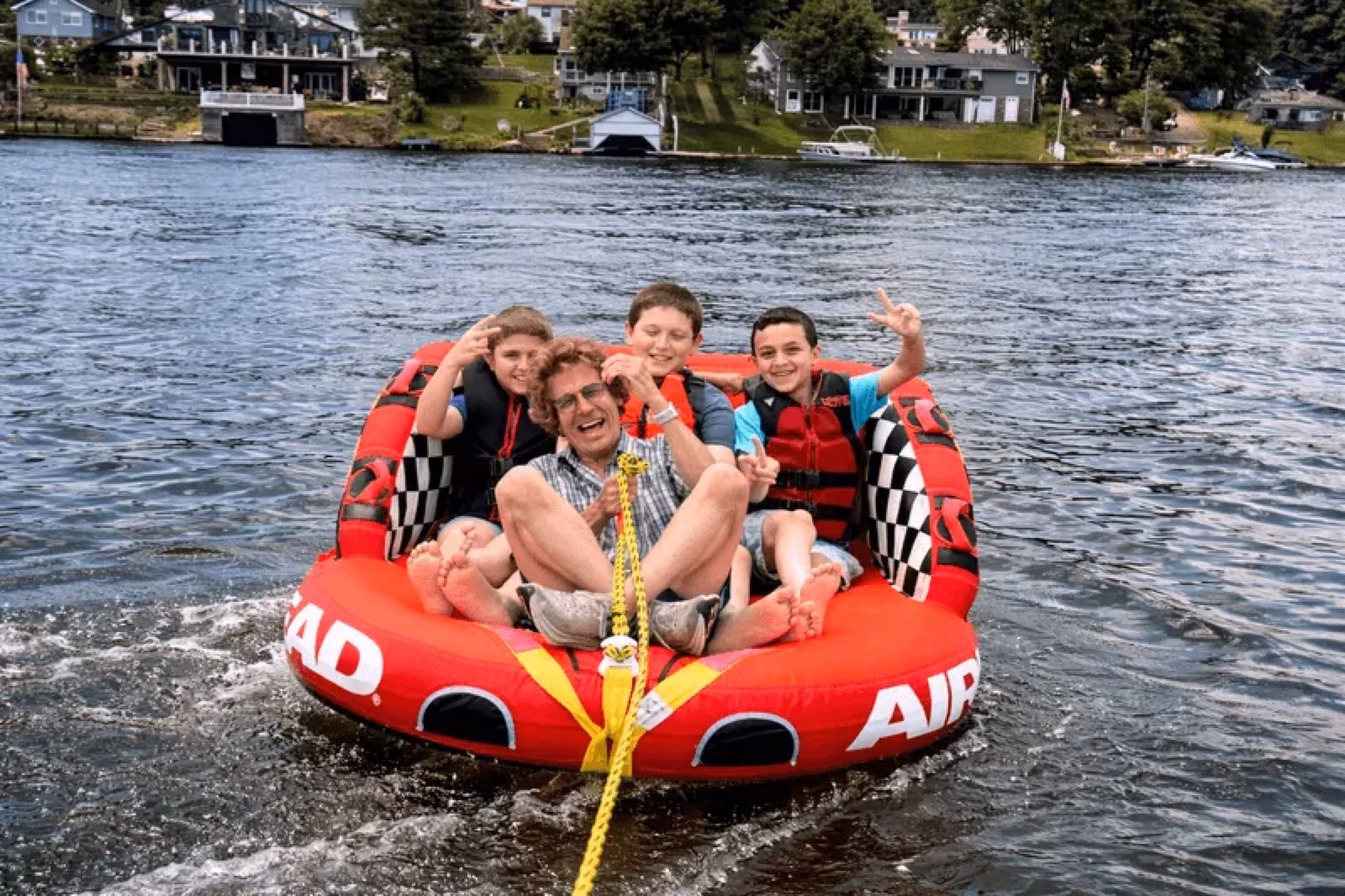 Friends tubing on the lake