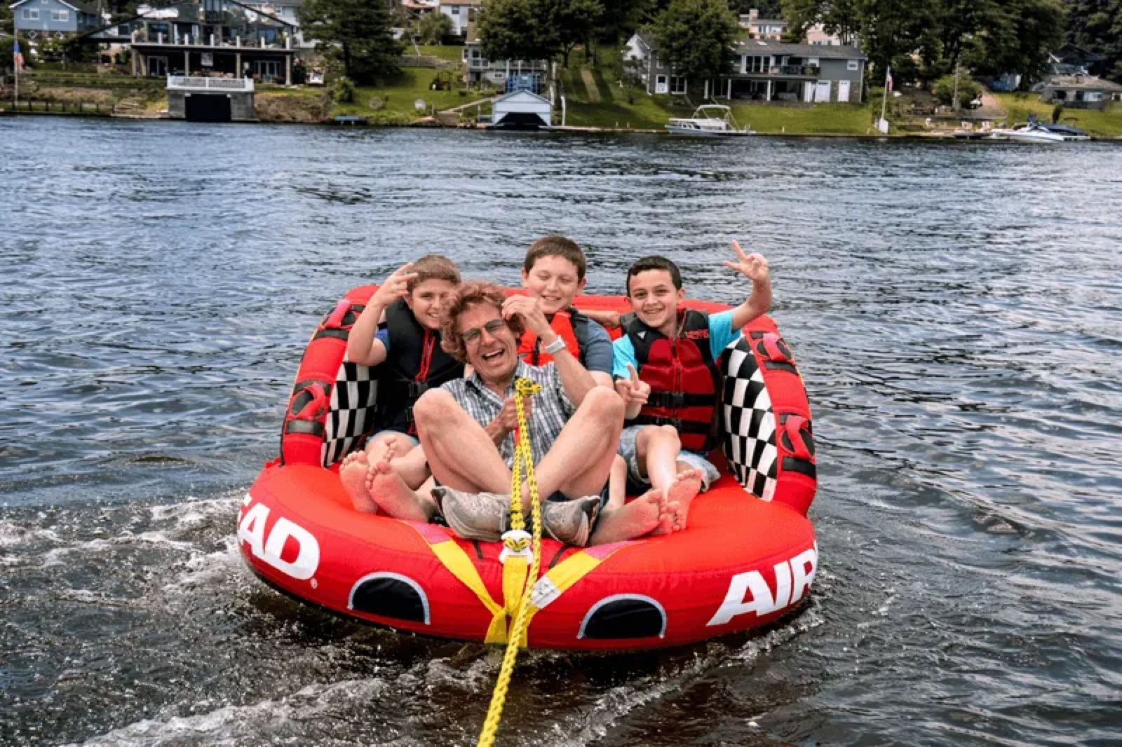 Friends tubing on the lake